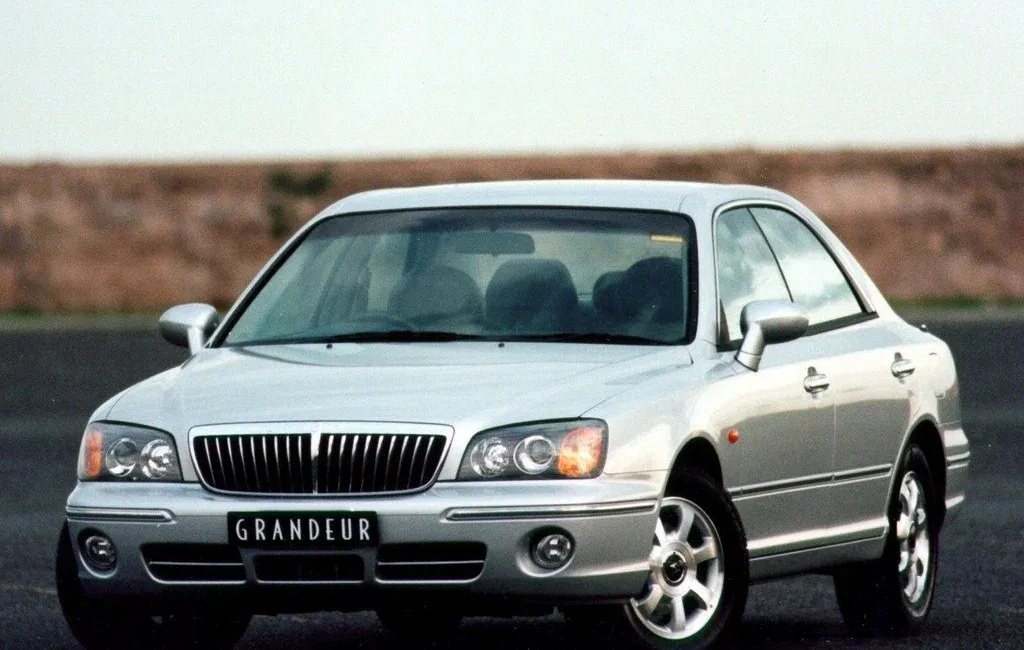 Логотип Grandeur