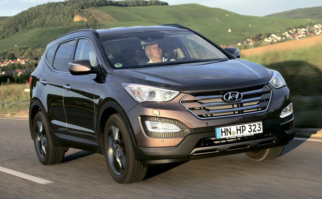 Логотип Hyundai Santa Fe Внедорожник 5 дв. 3 поколение