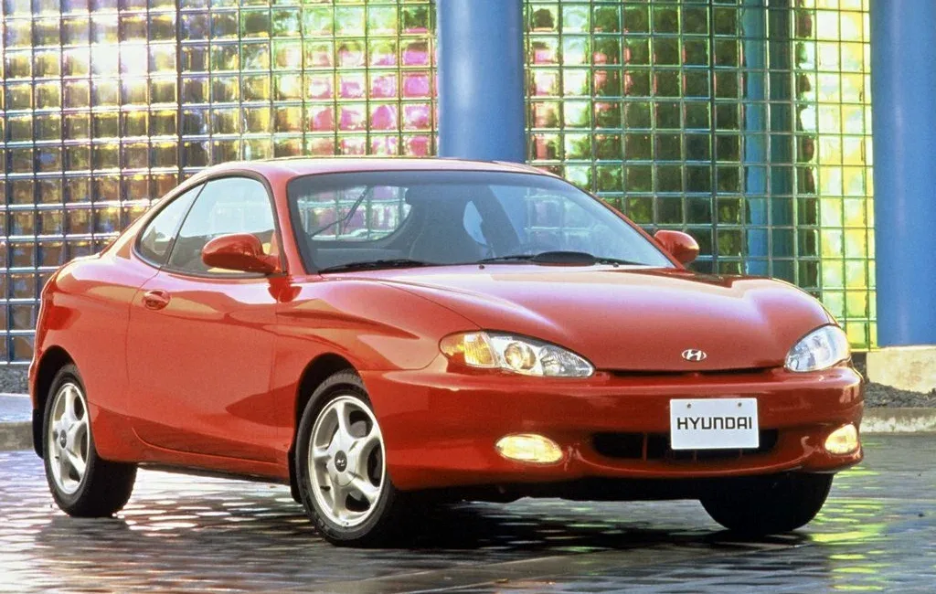 Логотип Hyundai Tiburon Купе 2 дв. 1 поколение