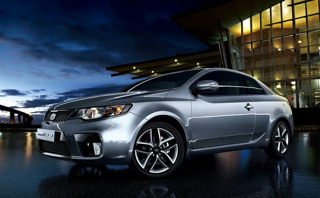 Логотип Kia Cerato Купе 2 дв. 2 поколение