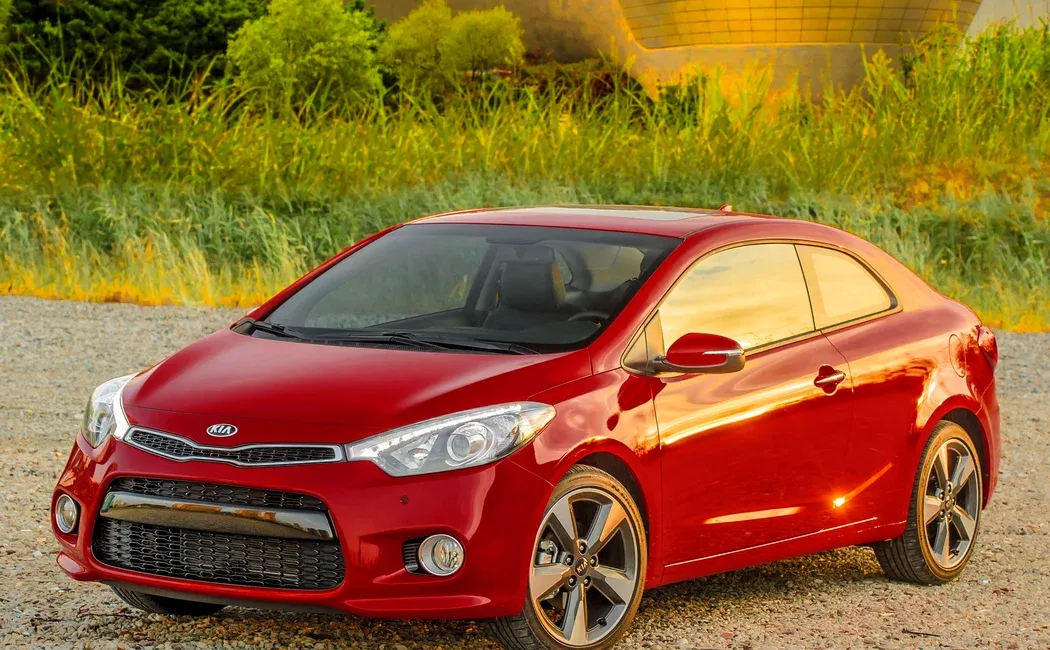 Логотип Kia Cerato Купе 2 дв. 3 поколение
