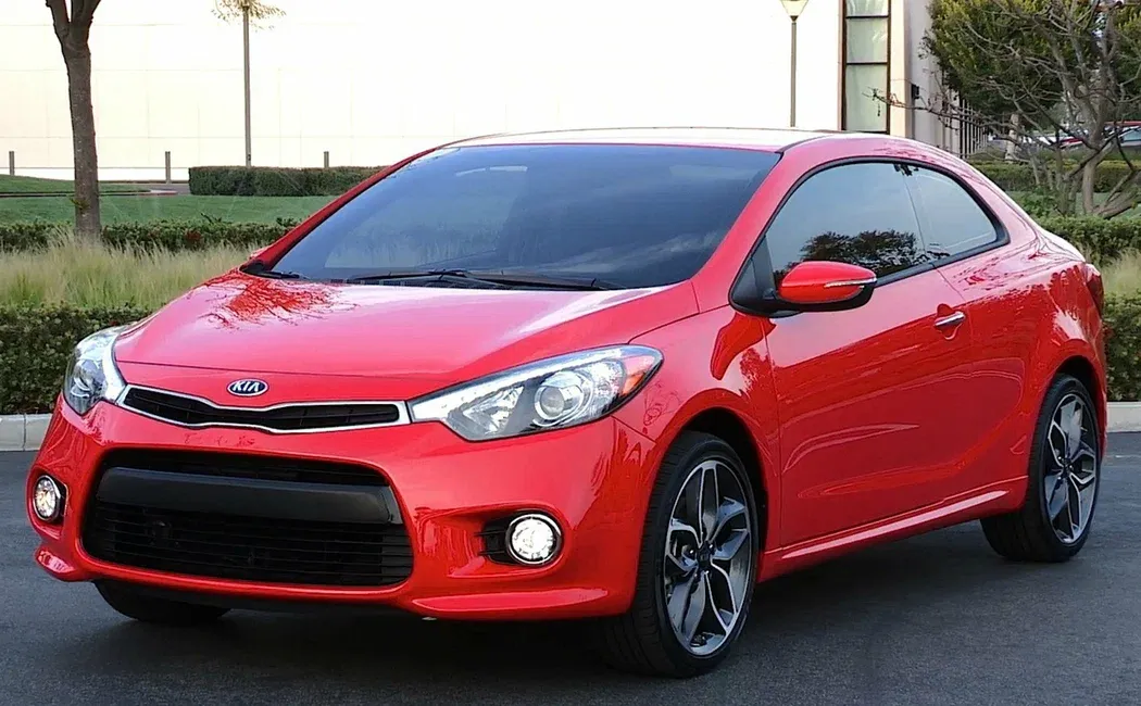 Логотип Kia Forte Купе 2 дв. 2 поколение