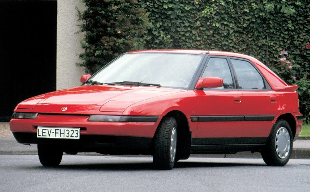 Логотип Mazda 323 Хэтчбек 5 дв. 4 (BG)