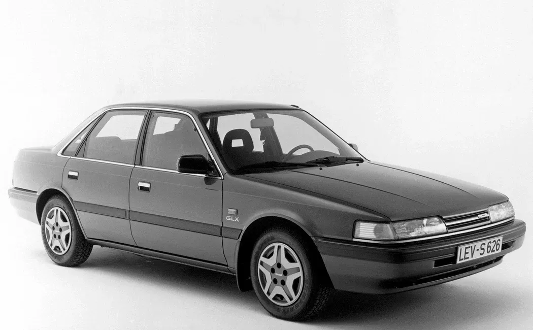 Логотип Mazda 626 Седан 4 дв. 3 (GD)