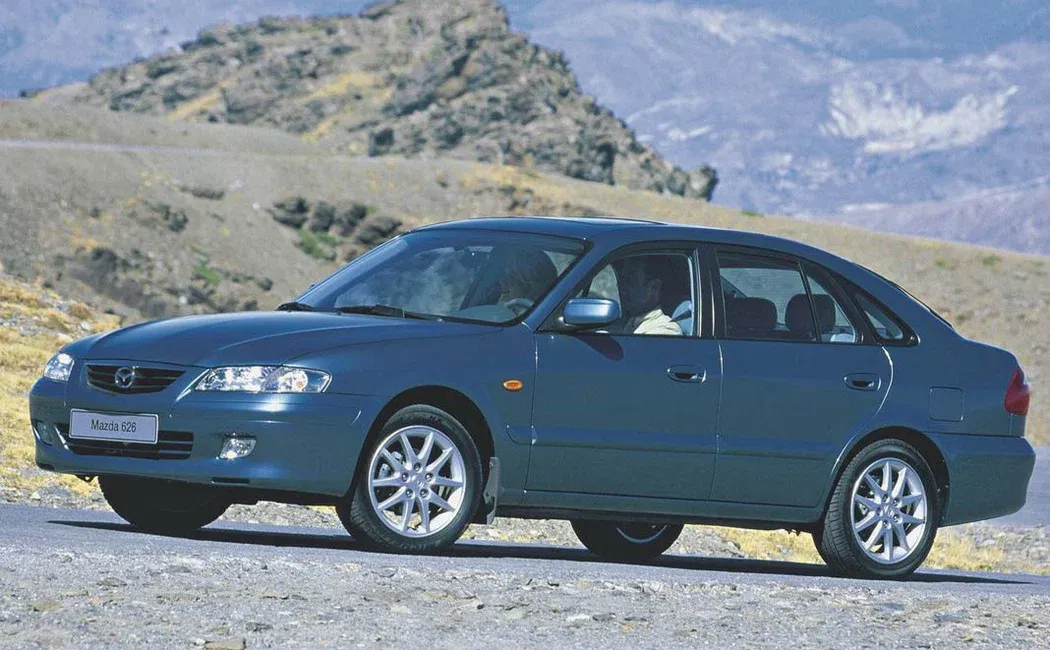 Логотип Mazda 626 Хэтчбек 5 дв. 5 (GF)