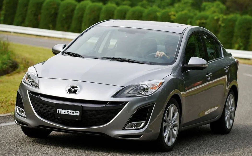 Логотип Mazda Axela Седан 4 дв. 2 поколение