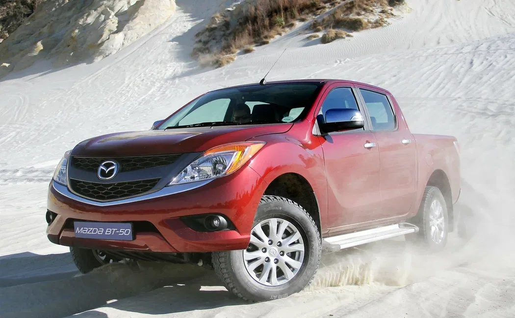 Логотип Mazda BT-50 Пикап 4 дв. 2 поколение