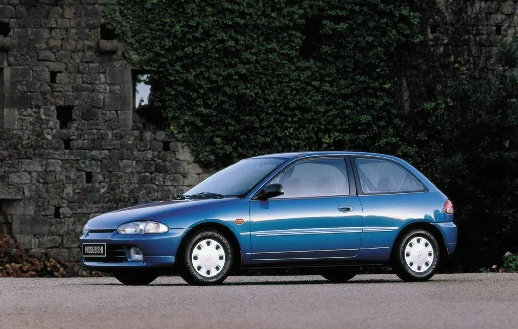 Логотип Mitsubishi Colt Хэтчбек 3 дв. 4 (CA0)