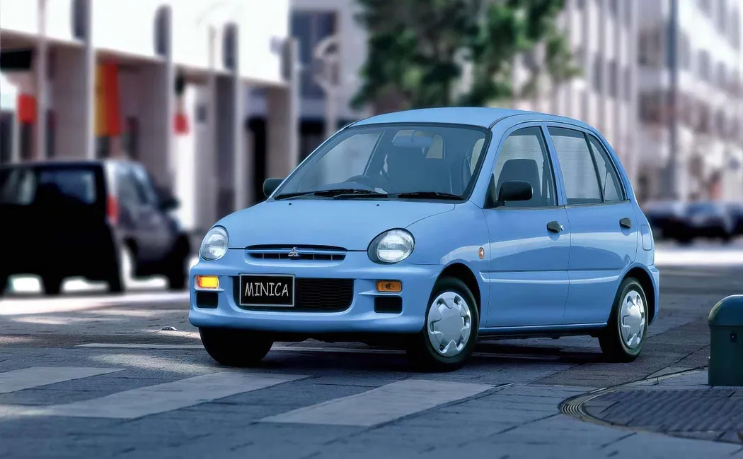 Логотип Minica