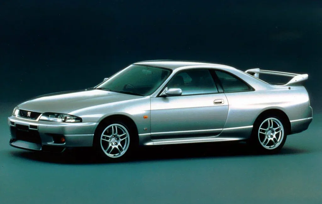 Логотип Nissan Skyline Купе 2 дв. 9 (R33)