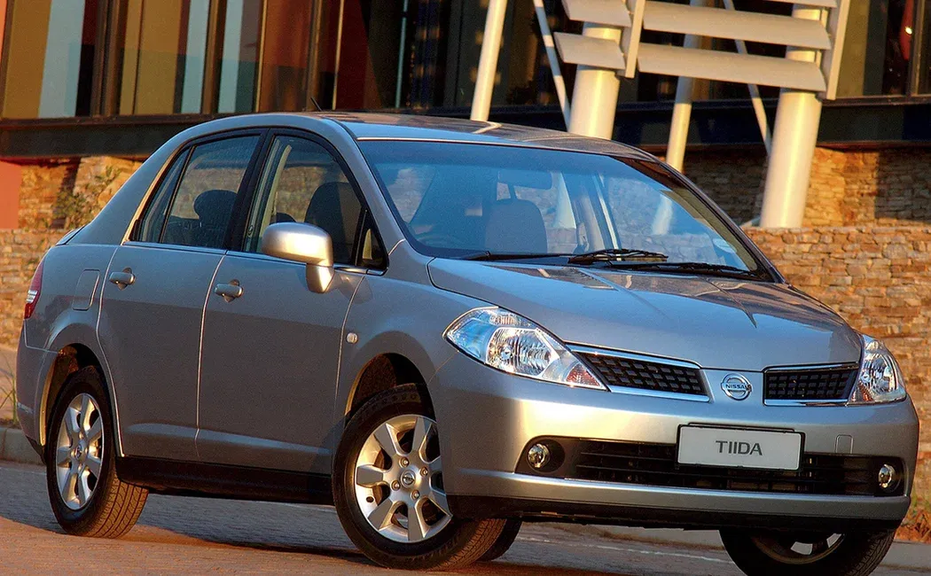 Логотип Tiida