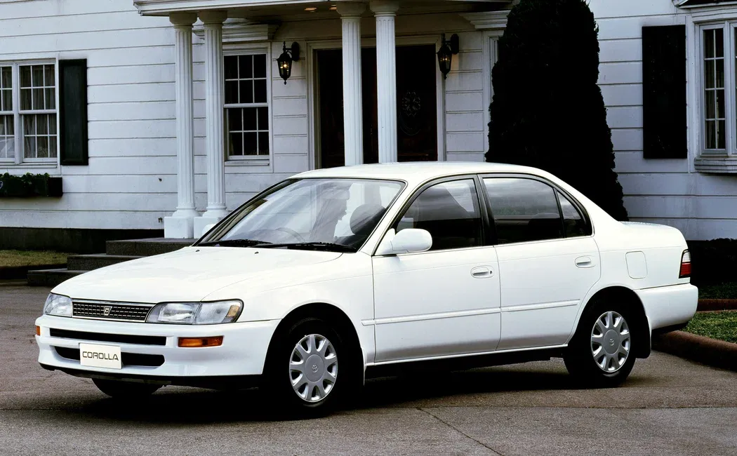 Логотип Toyota Corolla Седан 4 дв. 7 (E100)